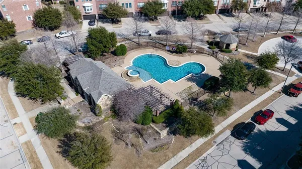 an aerial view of a house with outdoor space