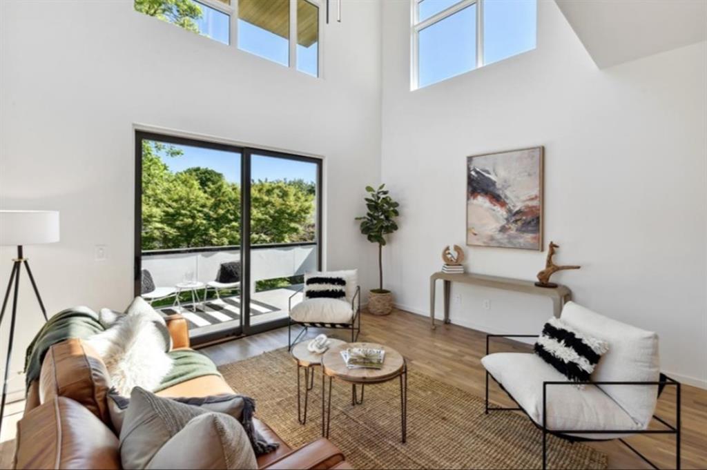 536 Highland Avenue Northeast, Unit B Atlanta, GA 30312 - Photo 17 of 62 a living room with furniture and a window