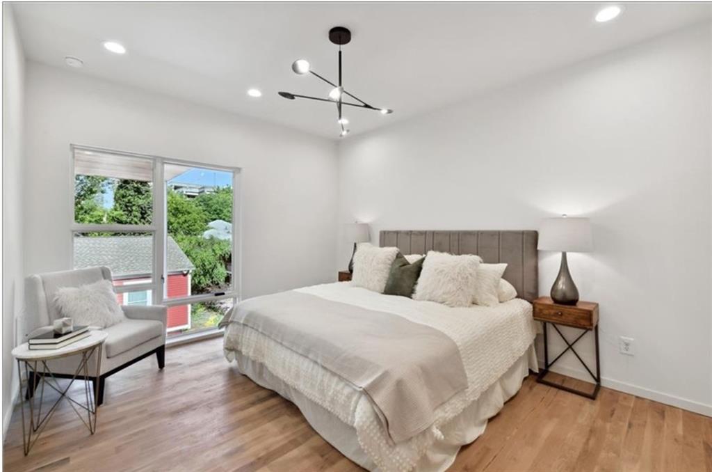 536 Highland Avenue Northeast, Unit B Atlanta, GA 30312 - Photo 22 of 62 a bedroom with a bed and a window