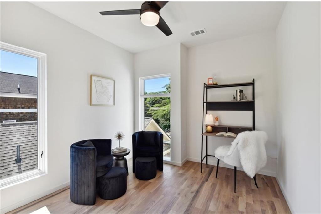 536 Highland Avenue Northeast, Unit B Atlanta, GA 30312 - Photo 27 of 62 a workspace with furniture and a window