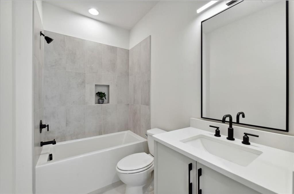 536 Highland Avenue Northeast, Unit B Atlanta, GA 30312 - Photo 28 of 62 a bathroom with a sink and a mirror
