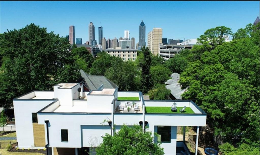 536 Highland Avenue Northeast, Unit B Atlanta, GA 30312 - Photo 3 of 62 a view of a city with tall buildings