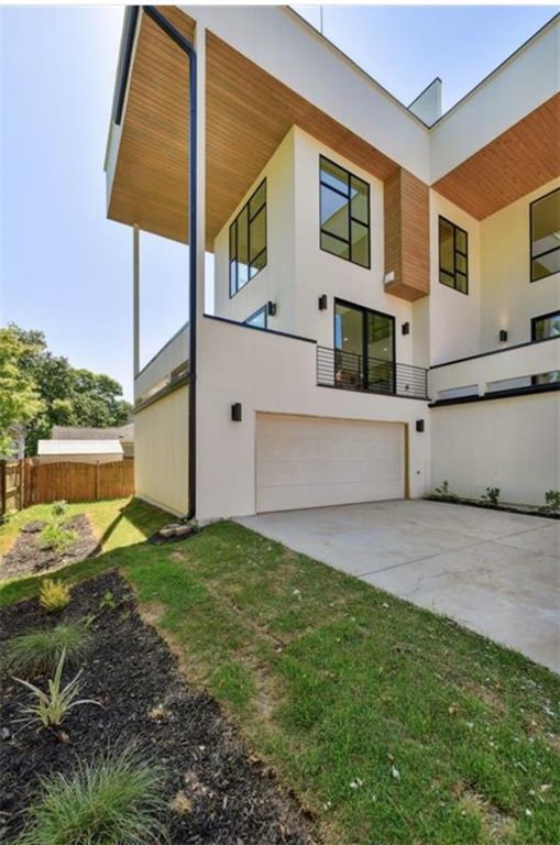 536 Highland Avenue Northeast, Unit B Atlanta, GA 30312 - Photo 40 of 62 a view of a back yard of the house