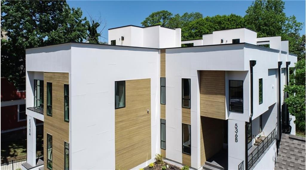 536 Highland Avenue Northeast, Unit B Atlanta, GA 30312 - Photo 49 of 62 a view of a house with entryway and tree