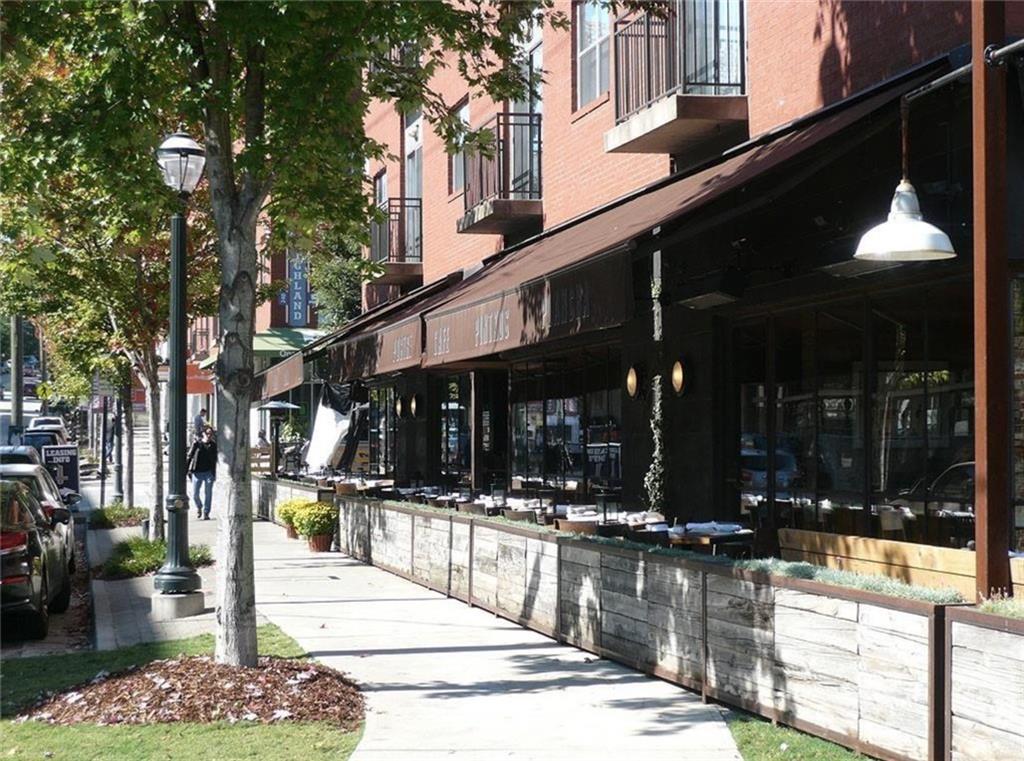 536 Highland Avenue Northeast, Unit B Atlanta, GA 30312 - Photo 59 of 62 a outdoor view of a building with traffic signal lights