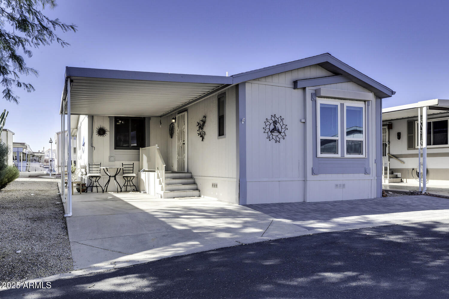 17200 West Bell Road, Unit 1745 Surprise, AZ 85374 - Photo 23 of 24 a view of a house with a patio