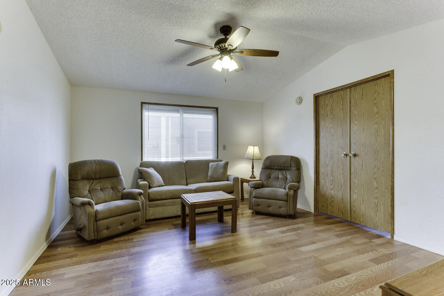 17200 West Bell Road, Unit 1745 Surprise, AZ 85374 - Photo 8 of 24 a living room with furniture and a window