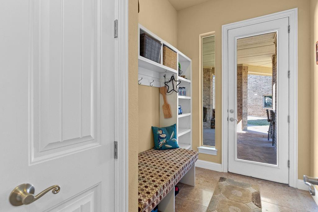 117 Citation Drive Cresson, TX 76035 - Photo 19 of 40 Mudroom featuring light tile patterned flooring and baseboards