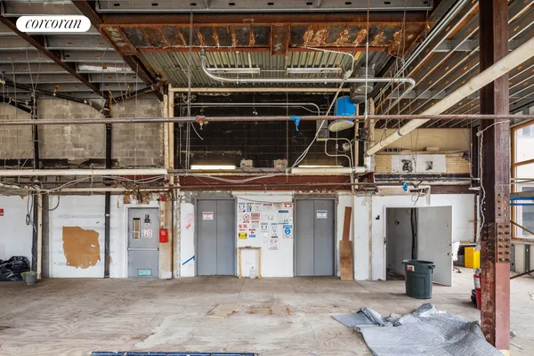 a view of lobby with furniture and floor to ceiling window