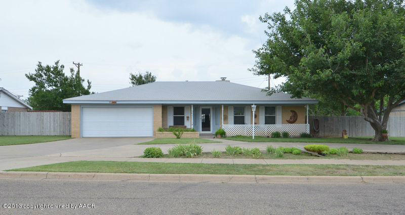 5111 Shield Drive Amarillo, TX 79110 - Photo 1 of 23 a front view of a house with a garden