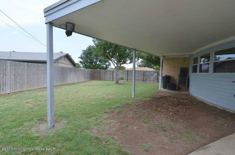 5111 Shield Drive Amarillo, TX 79110 - Photo 20 of 23 a view of a backyard with a garden