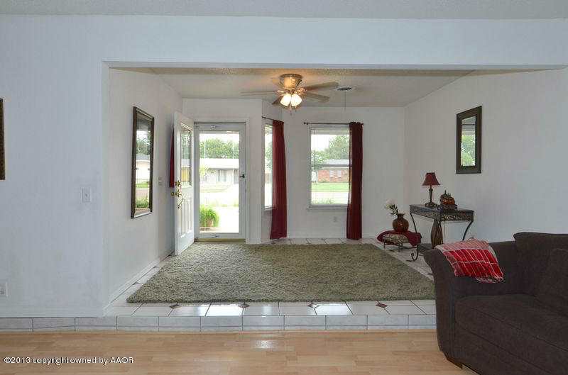 5111 Shield Drive Amarillo, TX 79110 - Photo 2 of 23 a view of a livingroom with furniture and windows