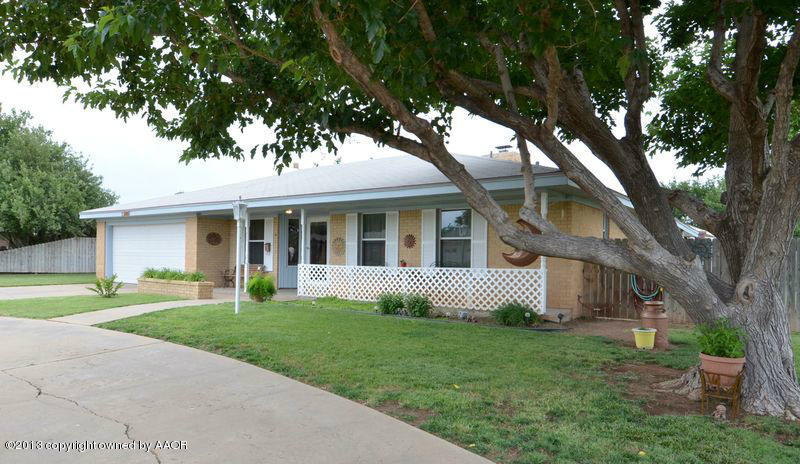 5111 Shield Drive Amarillo, TX 79110 - Photo 23 of 23 a front view of a house with a yard