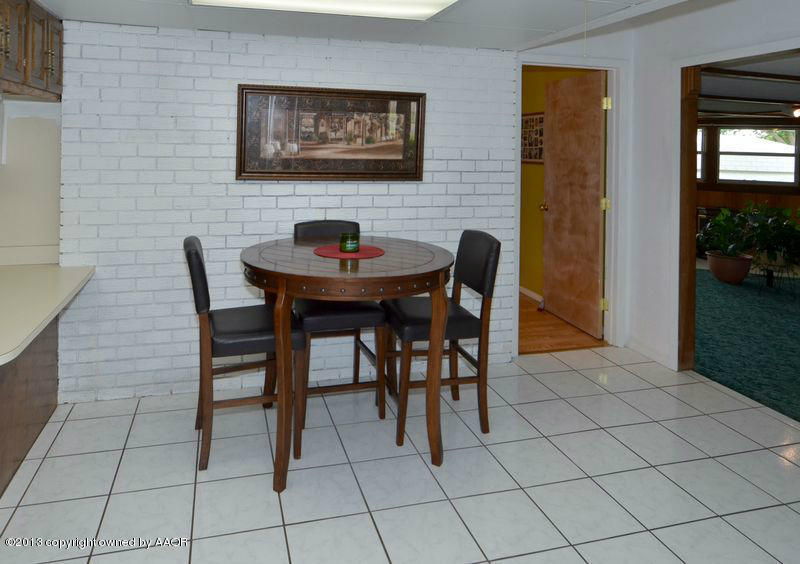 5111 Shield Drive Amarillo, TX 79110 - Photo 8 of 23 a dining room with furniture and window