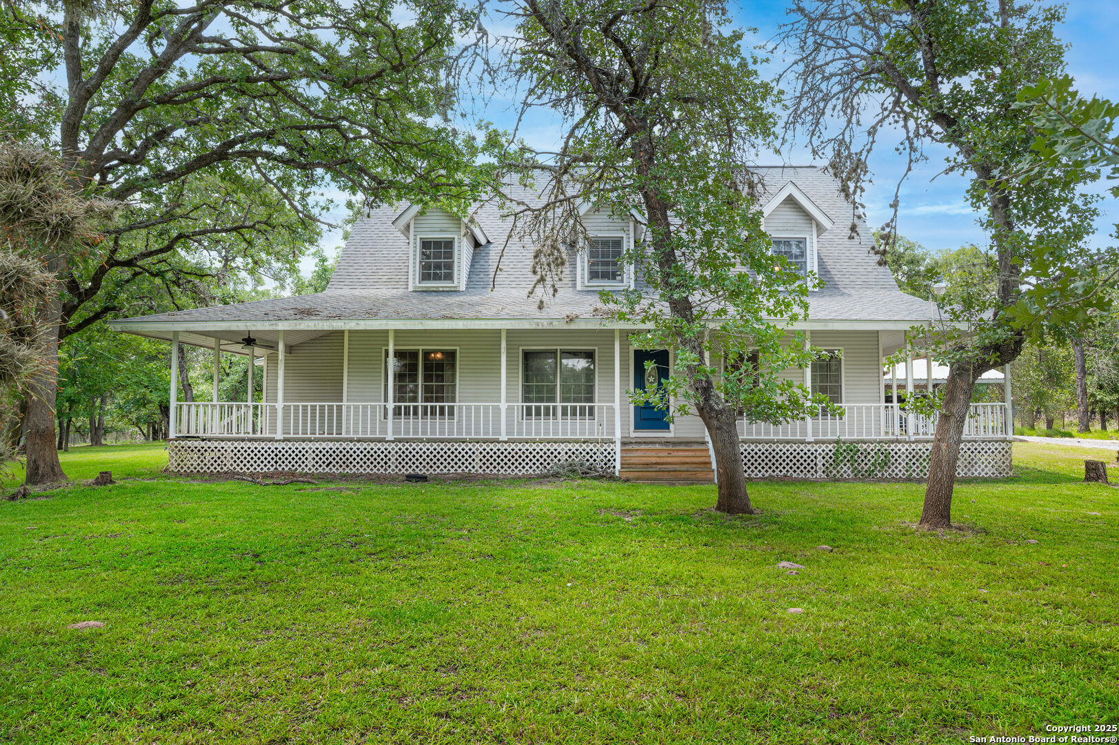 2981 Vivroux Ranch Road Seguin, TX 78155 - Photo 2 of 50 front view of a house with a yard