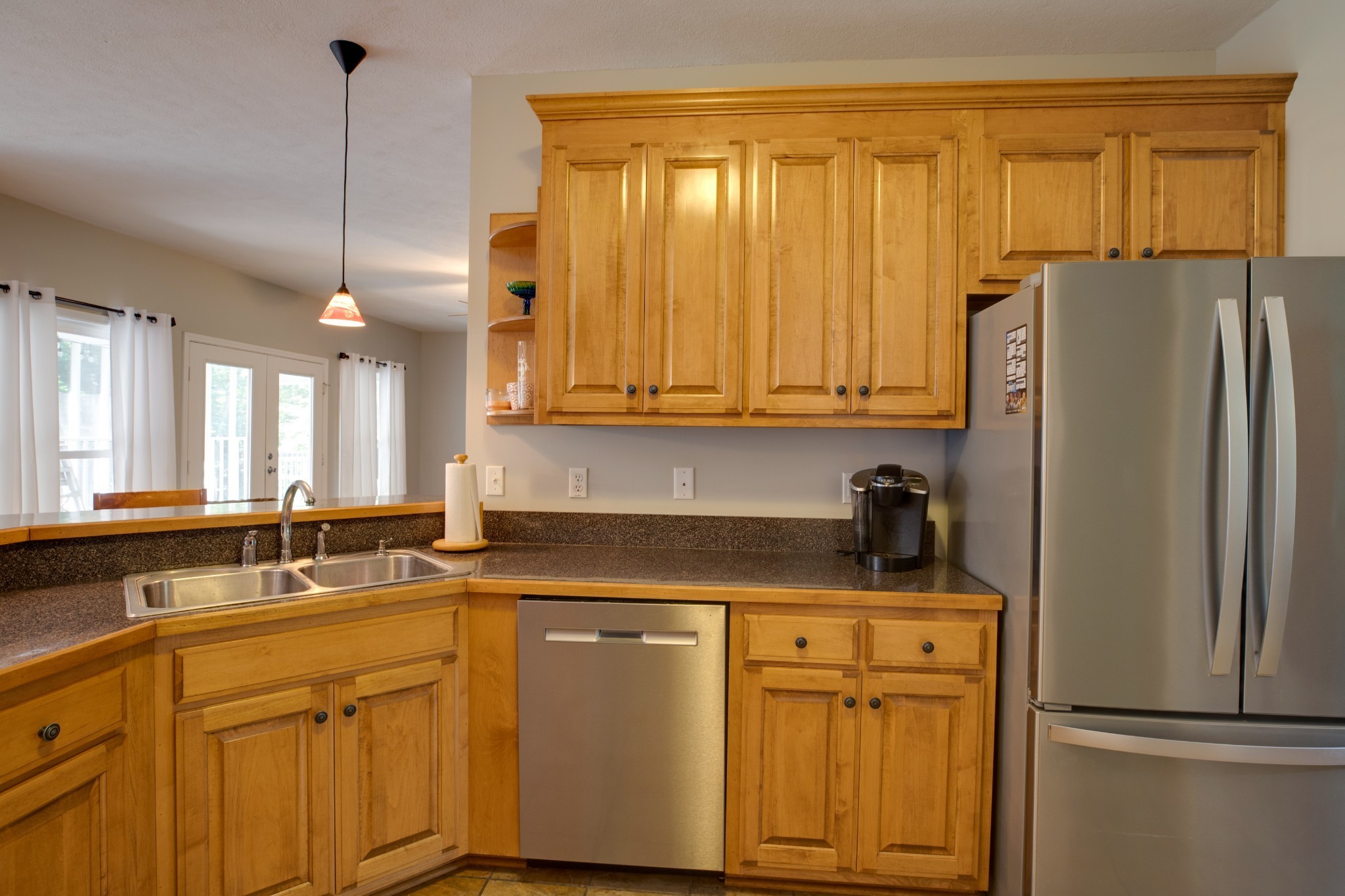 198 Arvitt Road Dickson, TN 37055 - Photo 13 of 36 a kitchen with stainless steel appliances granite countertop a refrigerator a sink and white cabinets