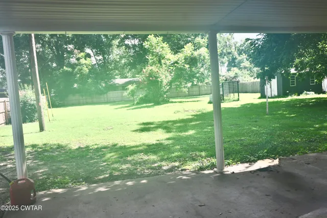 a view of outdoor space and yard