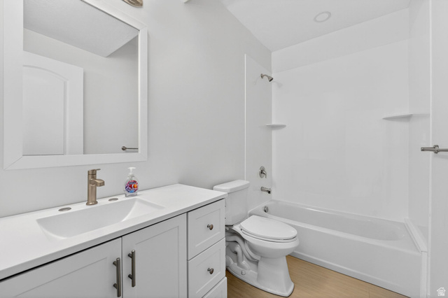 572 West 500th Street North Mapleton, UT 84664 - Photo 27 of 46 Bathroom featuring vanity, shower combination, and light wood-style floors
