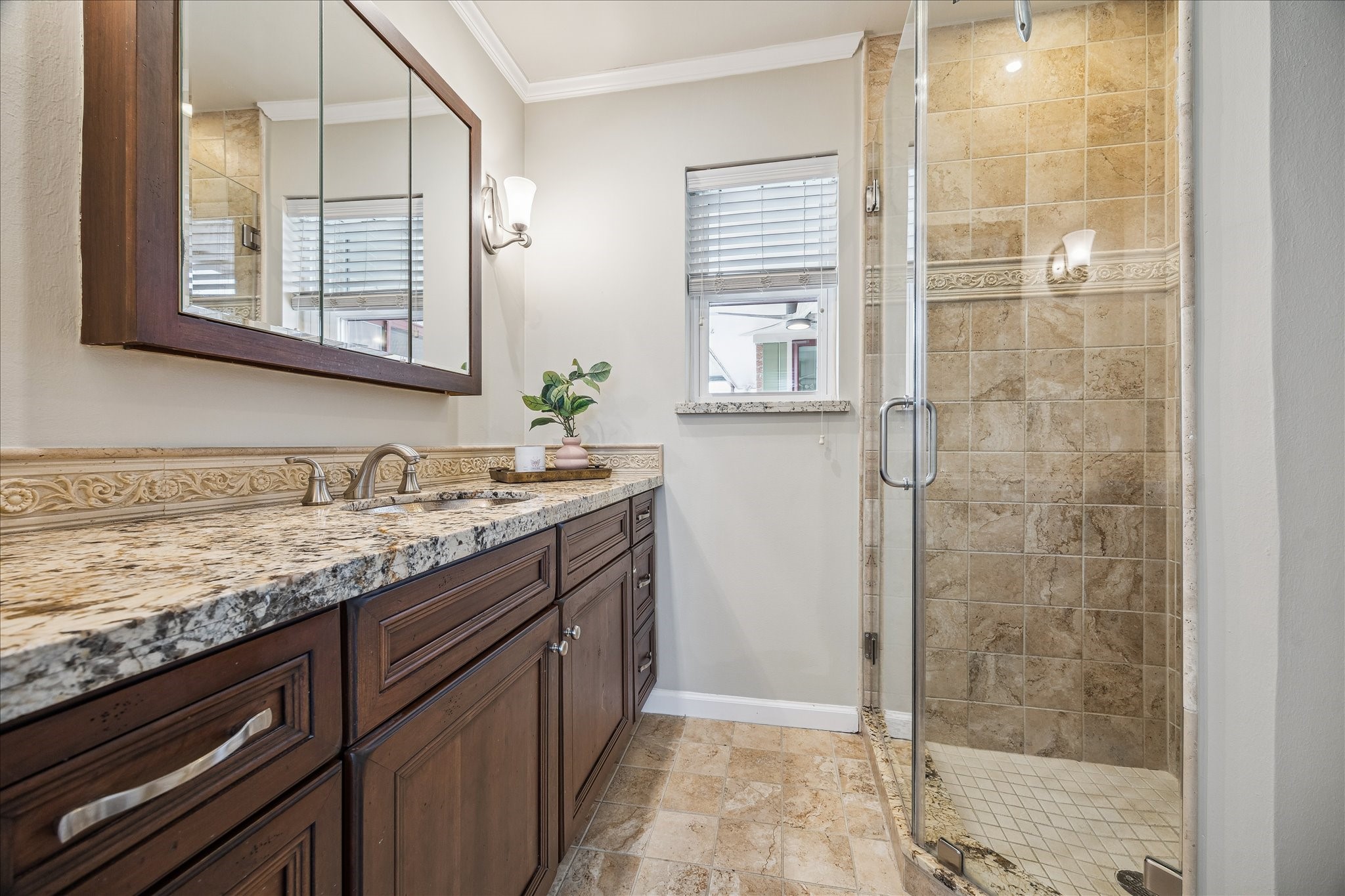 1251 Clovis Road Houston, TX 77008 - Photo 12 of 18 Built in vanity and custom tiled shower with seamless glass