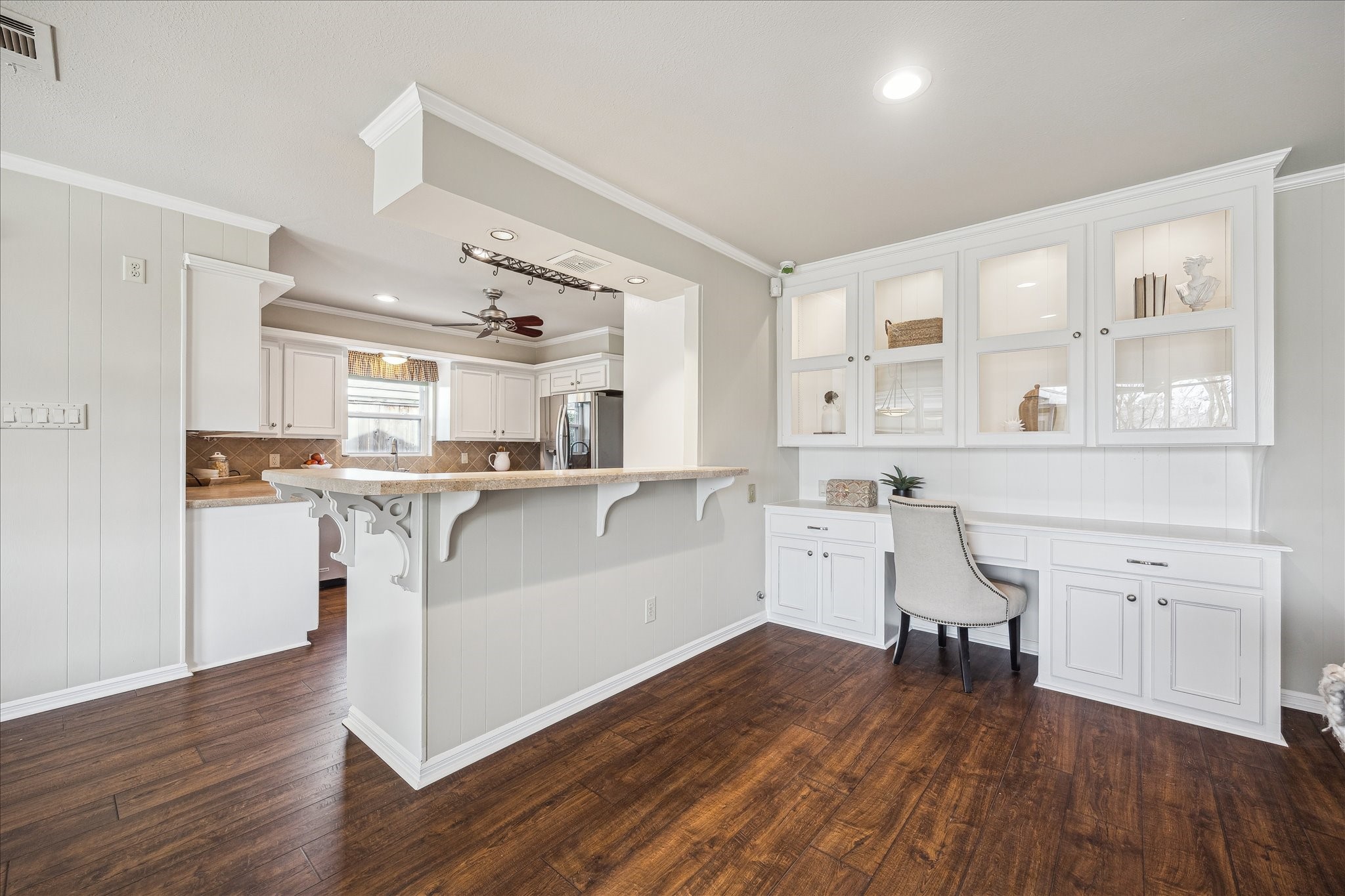 1251 Clovis Road Houston, TX 77008 - Photo 6 of 18 Desk area off the living room with custom built in shelving