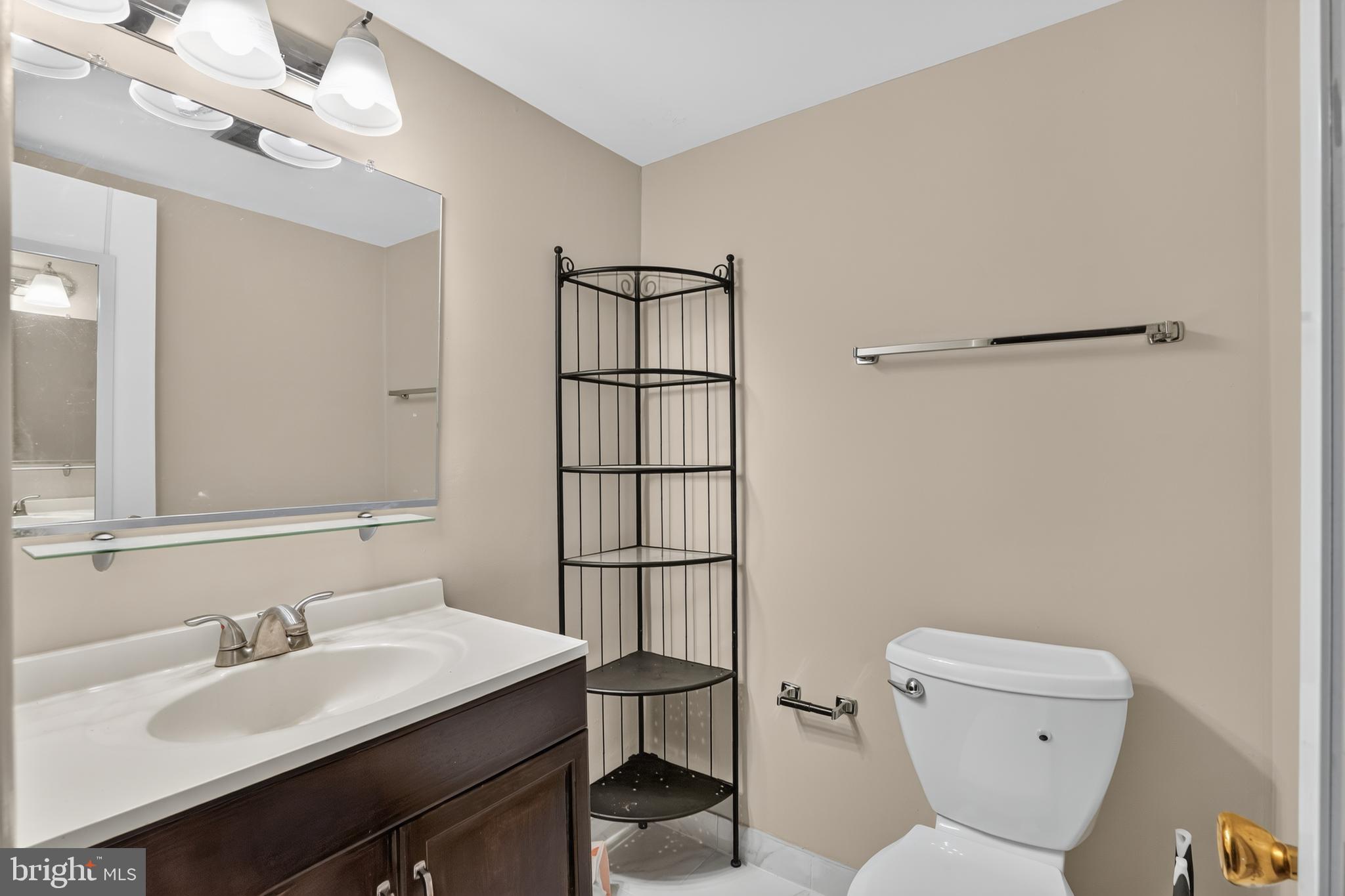 3358 Woodburn Road, Unit 22 Annandale, VA 22003 - Photo 14 of 19 Primary bedroom half-bath