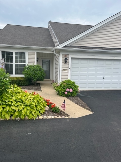 13691 Hemlock Road Huntley, IL 60142 - Photo 12 of 12 front view of a house with a small yard