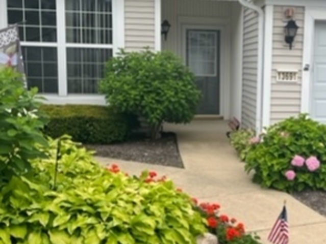 13691 Hemlock Road Huntley, IL 60142 - Photo 2 of 12 a view of a garden with potted plants