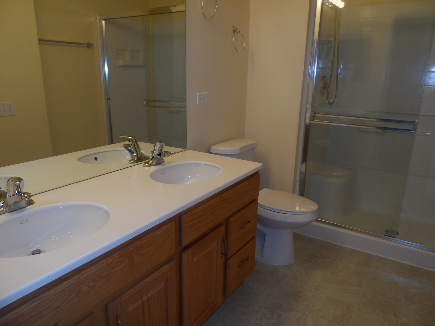 13691 Hemlock Road Huntley, IL 60142 - Photo 7 of 12 a bathroom with a sink toilet and shower