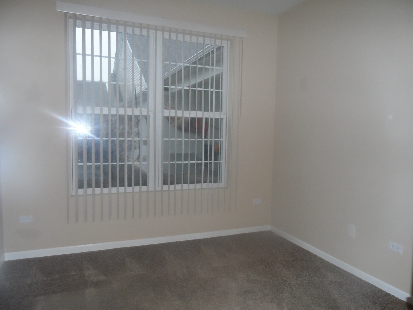 13691 Hemlock Road Huntley, IL 60142 - Photo 9 of 12 an empty room with windows