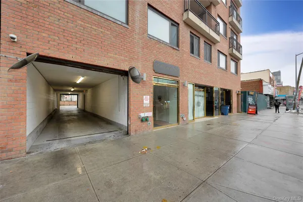a view of a building with a glass door