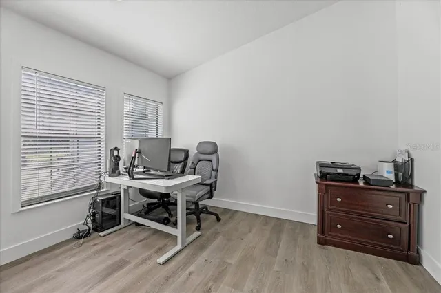a close view of sink with a potted plant