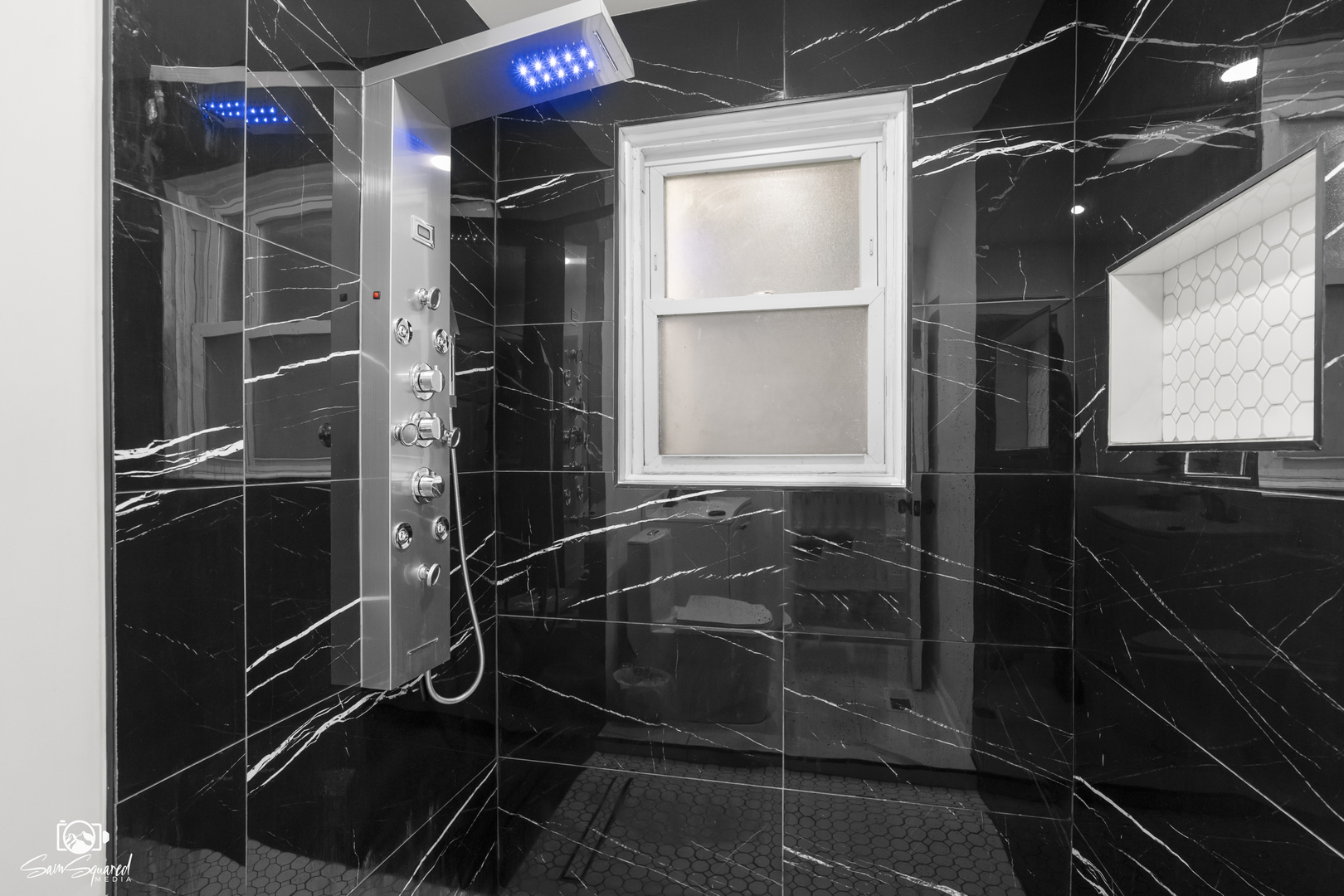 5636 South Carpenter Street Chicago, IL 60621 - Photo 11 of 27 a room with wooden floor