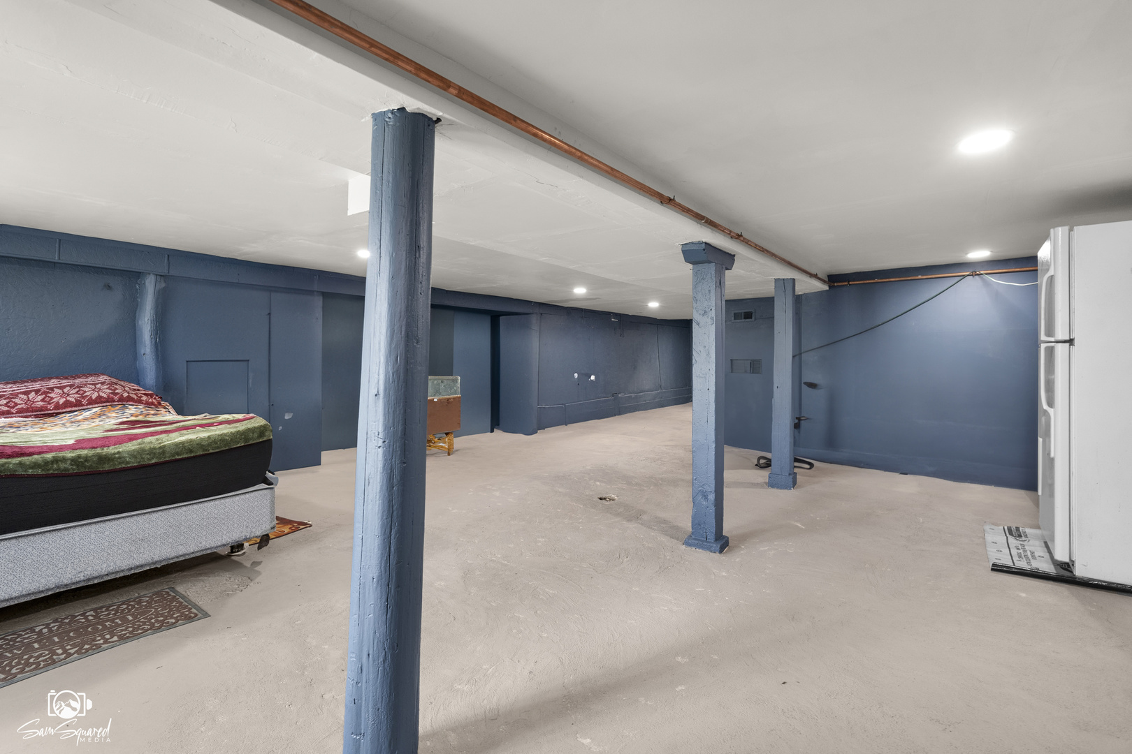 5636 South Carpenter Street Chicago, IL 60621 - Photo 18 of 27 a bedroom with a bed and a walk in closet