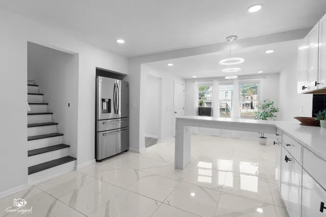 a kitchen with stainless steel appliances cabinets and a kitchen