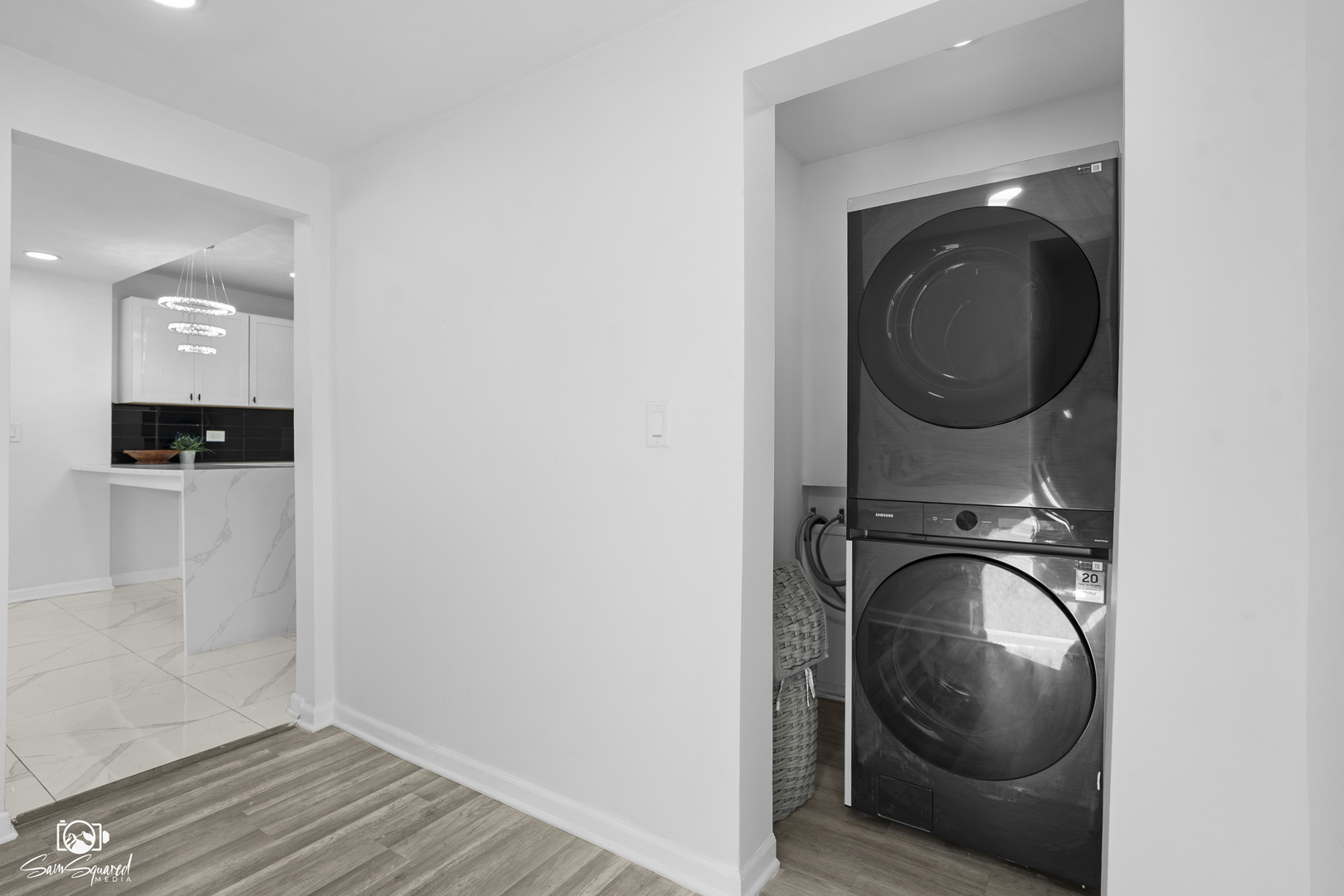 5636 South Carpenter Street Chicago, IL 60621 - Photo 9 of 27 a view of a hallway with washer and dryer
