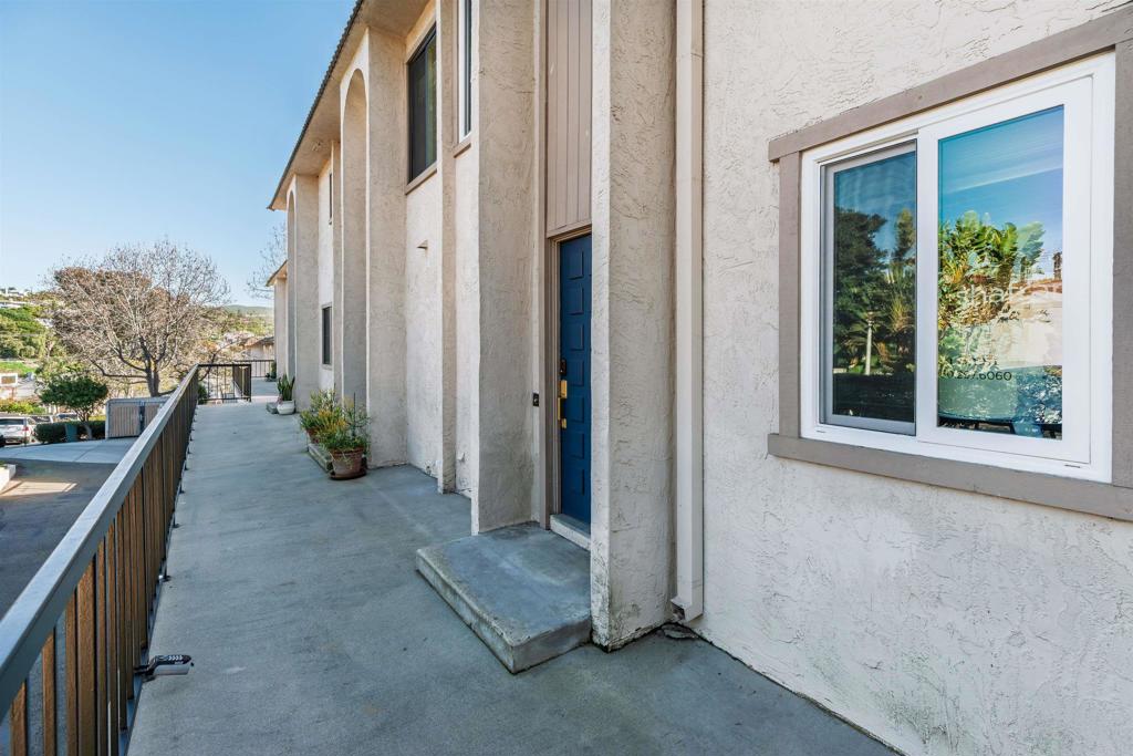 2349 Altisma Way, Unit B Carlsbad, CA 92009 - Photo 31 of 36 a view of a house with backyard and sitting area
