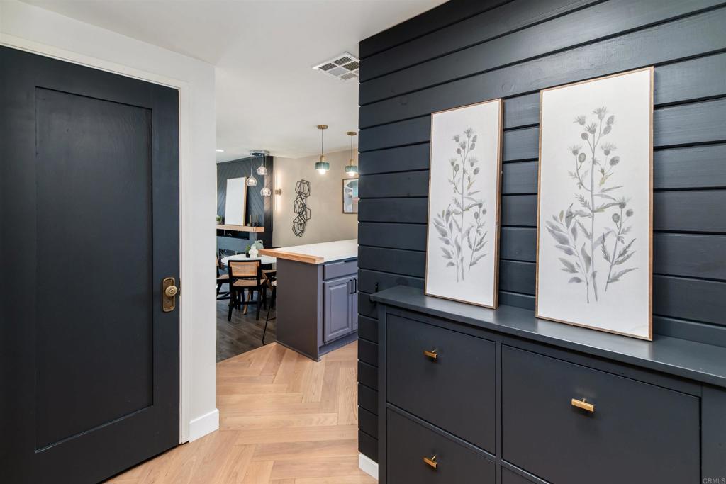 2349 Altisma Way, Unit B Carlsbad, CA 92009 - Photo 5 of 36 a view of kitchen with furniture and refrigerator