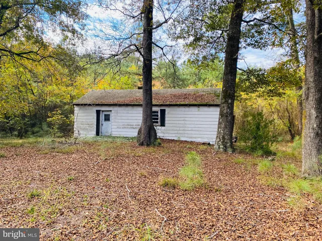 a view of a wooden fence