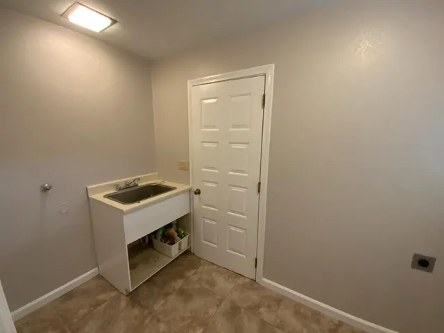 a utility room with washer and dryer