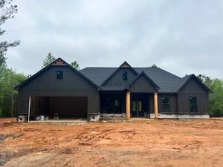816 Proctor Road Rockmart, GA 30153 - Photo 1 of 1 a view of a house with a yard and large tree