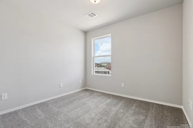 an empty room with a window