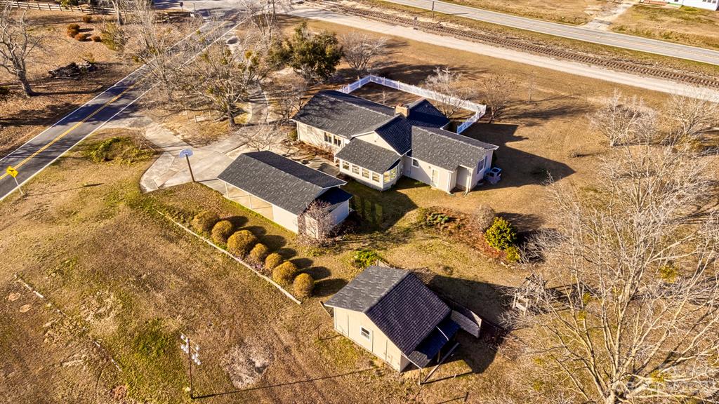 117 State Rd S-29-221 Kershaw, SC 29067 - Photo 1 of 28 an aerial view of a house with backyard