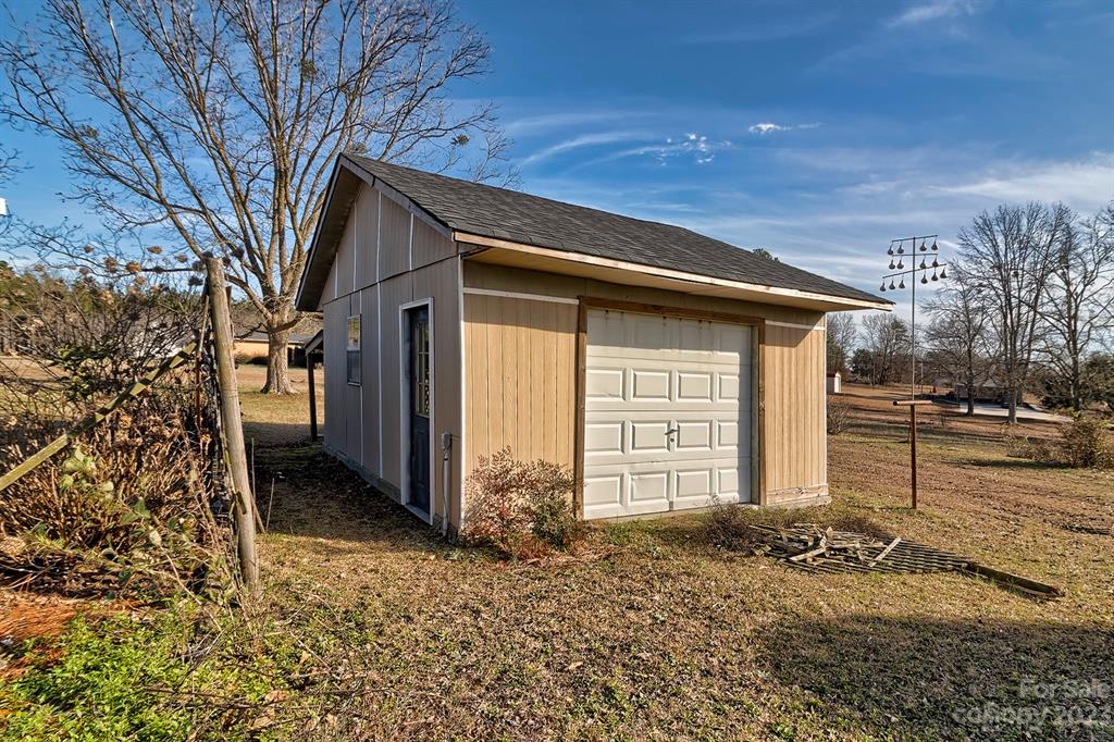 117 State Rd S-29-221 Kershaw, SC 29067 - Photo 9 of 28 a front view of a house with a yard