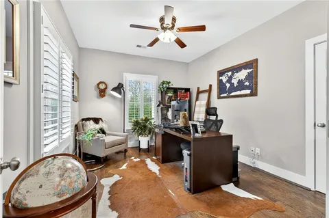 a living room with furniture and window