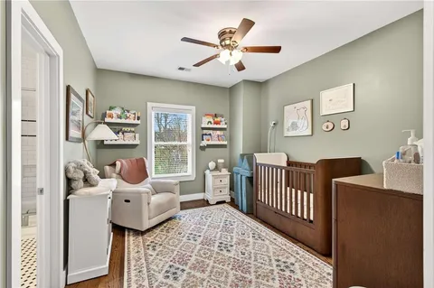 a bedroom with furniture and a window