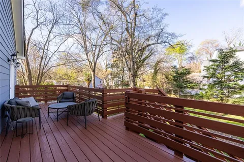 a view of outdoor sitting area with chairs
