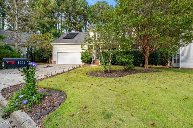 a house with trees in front of it