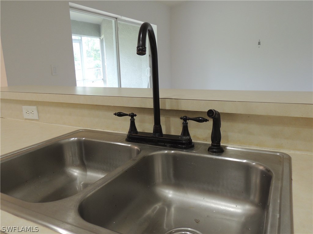 112 Ridgemont Drive Lehigh Acres, FL 33972 - Photo 7 of 18 a close view of sink