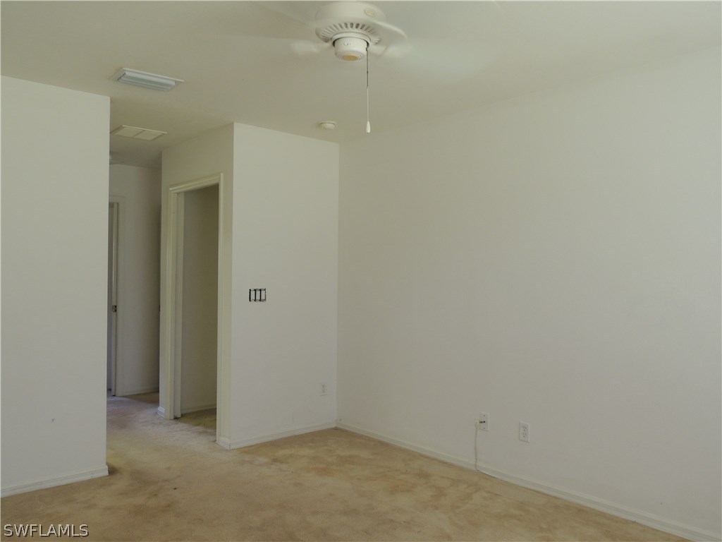 112 Ridgemont Drive Lehigh Acres, FL 33972 - Photo 8 of 18 a view of a bathroom