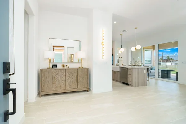 a view of a kitchen and a window